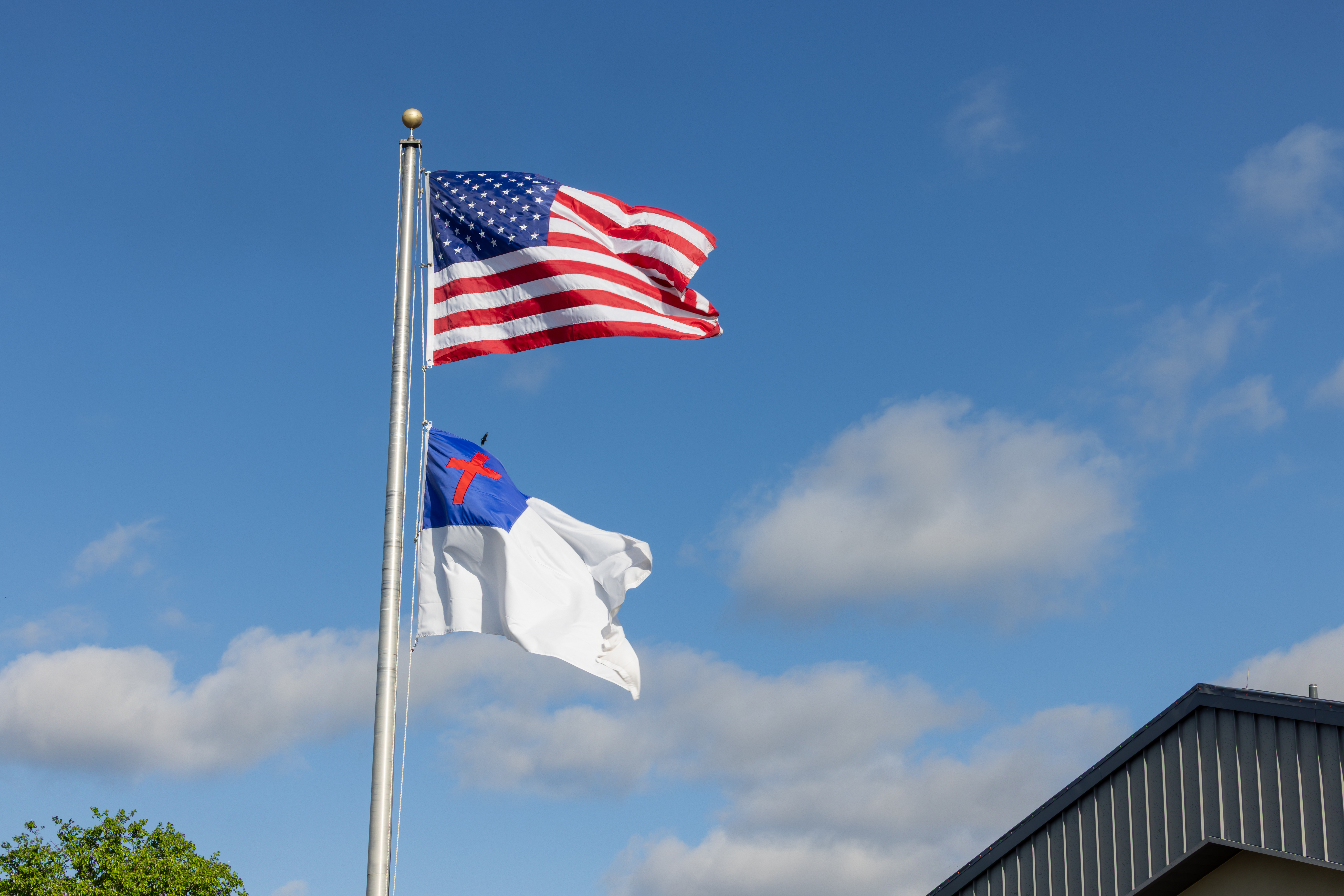 An American flag representing veterans, active duty military, and first responders